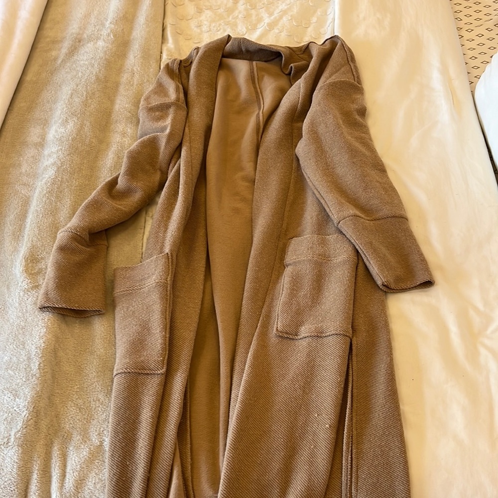 Women’s tan long cardigan.